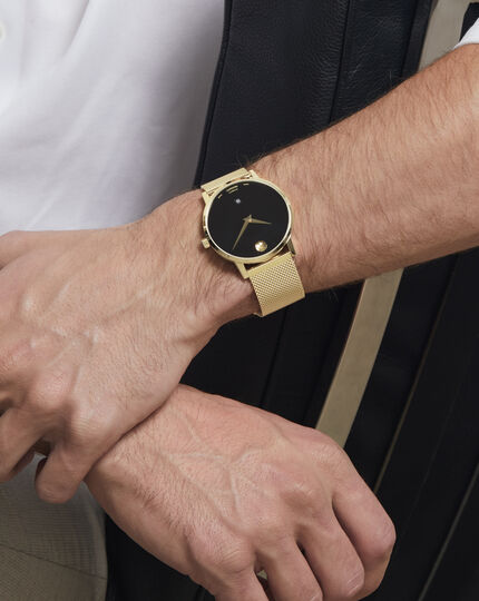 gold Classic with | black watch Museum dial Movado strap and