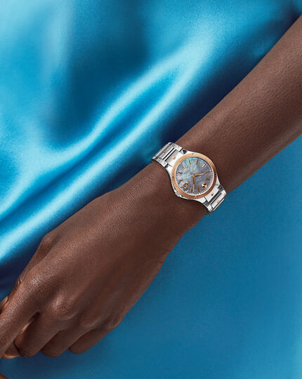 Movado | SE watch with two tone bracelet and mother of pearl dial